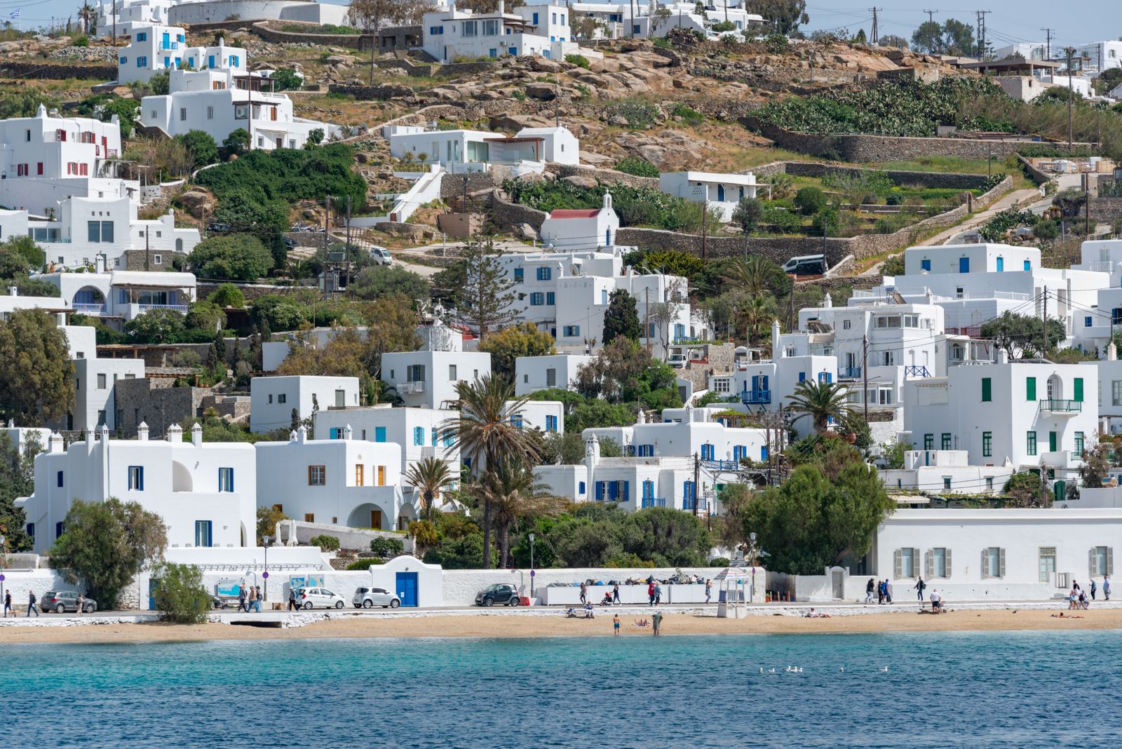 White houses and blue water on the Mykonos waterfront
